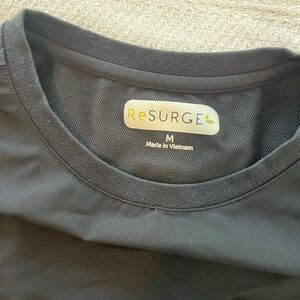 Woman’s T-shirt style scrub top.